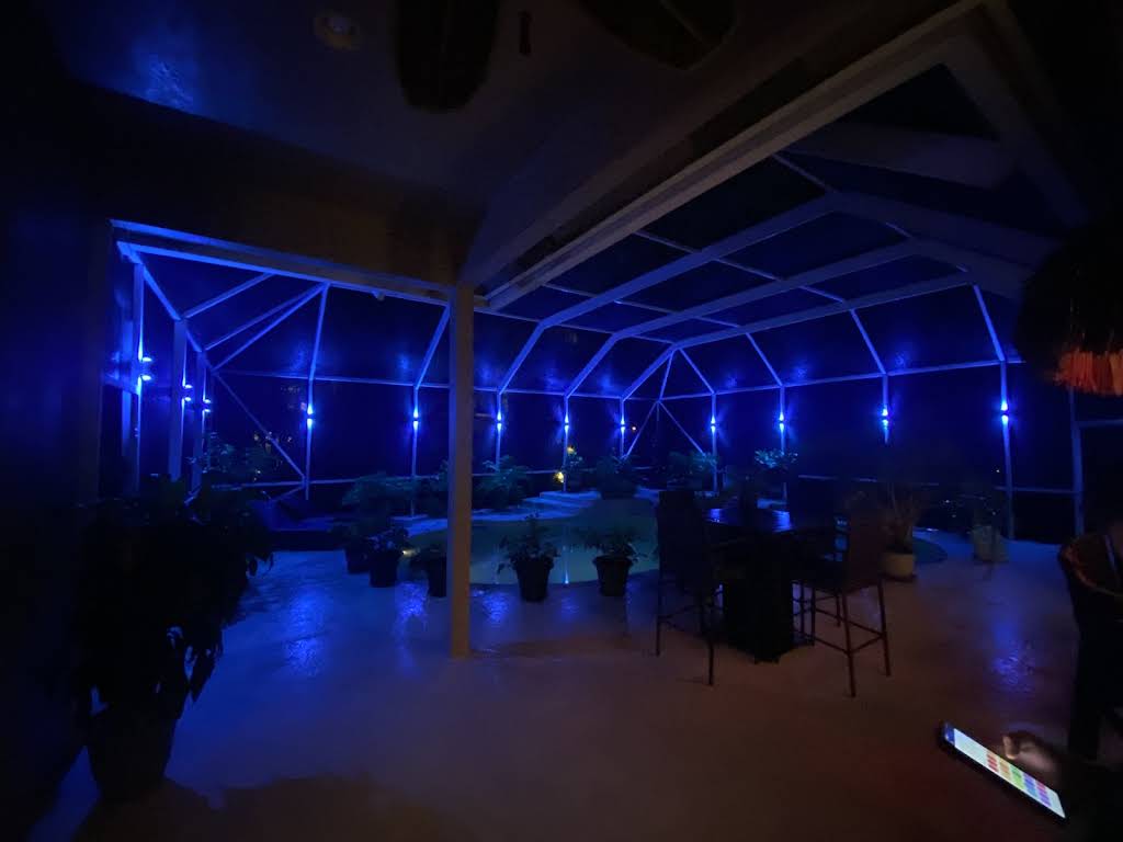 LED landscape lighting system illuminating walkways and garden beds