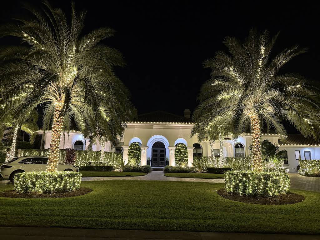 Professional landscape lighting installation by S.F. Outdoor Lighting in Boca Raton